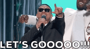 Celebrity gif. P Diddy and Frank the Butler on stage at the 2022 Billboard Music Awards shout "Let's go!"