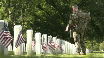 US Soldiers Place Flags at Arlington Cemetery