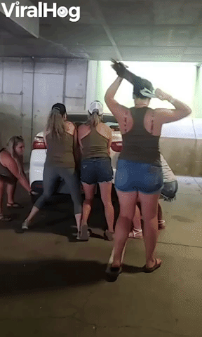 Girl Power Pushes Poorly Parked Car