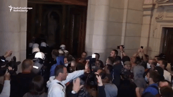 Protesters in Belgrade Storm Parliament After New Coronavirus Restrictions Announced