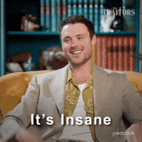 Sponsored gif. Traitors cast member Dylan Efron smiles while saying, “It’s insane.” Text also reads, “It’s insane.”