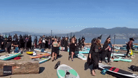 Witches Swap Broomsticks for Paddleboards at Vancouver Beach