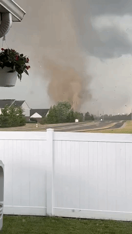 Funnel Cloud Sprays Debris Near Indianapolis Amid Tornado Warnings