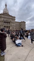 Demonstrators Stage 'Peaceful Sit-Down' at Michigan State Capitol After MSU Shooting