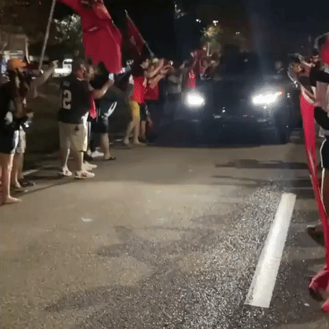Mike Evans Fist Bumps Fans as Victorious Bucs Return to Tampa