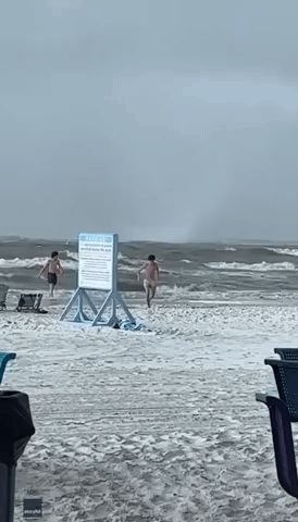 Beachgoers Scramble as Waterspout Makes Landfall in Florida