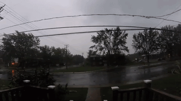Street Signs Bent, Roofs Damaged by Tornado in Lachute, Quebec