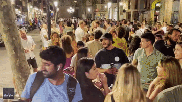 Bottle Hurled at Police as Barcelona Street Party Shut Down