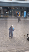 Couple Dances in Town Square