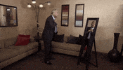 tying suit and tie GIF by Wheel of Fortune