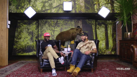 leg cross GIF by Desus & Mero