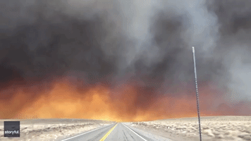 'Driving Into Armageddon': Motorist's Ominous View of Fire on California-Nevada State Line