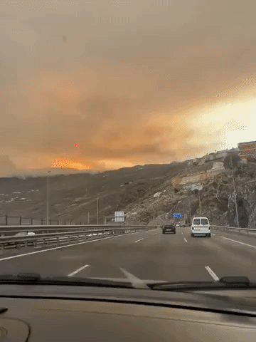 Sun Appears Red Above Tenerife as Wildfire Smoke Fills Sky