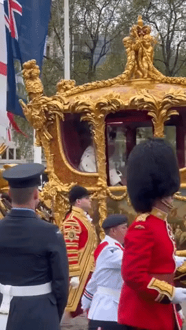 King Charles and Queen Camilla Greet Onlookers