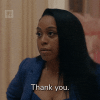 TV gif. DomiNque Perry as Aja in Diarra from Detroit pauses then half-smiles as she says, "Thank you," which appears as text.