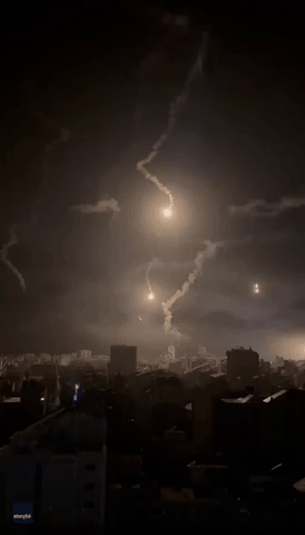 Flares Illuminate Night Sky Near Gaza's Shifa Hospital