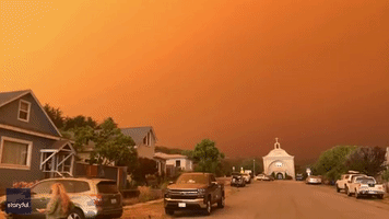 'Armageddon'-Like Orange Skies Captured Over Davenport Amid Lightning Complex Fire