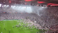 Frankfurt Fans Invade Pitch After Victory
