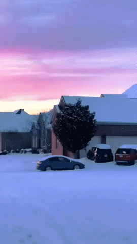 Sunset Glows Over Snow-Covered Arkansas Suburb