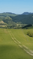 Agricultural Aircraft Takes Off From Grassy Makeshift Runway