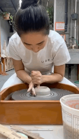 dianaluong giphyupload art clay throwing GIF