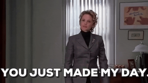 Movie gif. Amy Sedaris as Deb in Elf. She puts a hand up to her chest and smiles, touched at something someone has done. She says, "You just made my day!" and approaches us. 