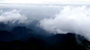 clouds mountains GIF by Joanie Lemercier