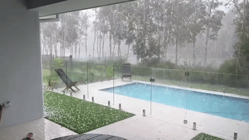 Hail Churns Queensland Pool Amid Severe Storms