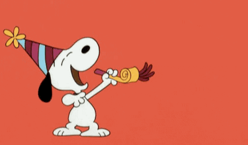 Peanuts gif. Snoopy wears a striped party hat and puts his whole body into blowing on a party horn, levitating as the horn blows.