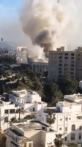 Smoke Rises From Libya's Ministry of Foreign Affairs Following Suicide Bomb Attack