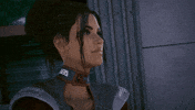 Video game gif. Panam in "Cyberpunk 2077" looks at us and smiles, tapping her temple knowingly.