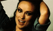 olivia wilde wink GIF