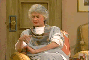TV gif. Bea Arthur as Dorothy on Golden Girls drops her head to her hand in frustration.