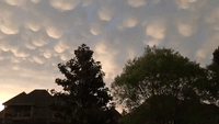 Heavy 'Mammary Clouds' Form at Sunset During Storms in Tulsa, Oklahoma