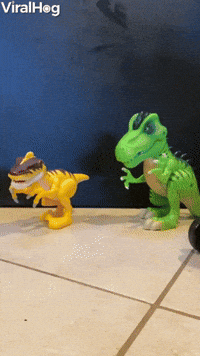 Bearded Dragon Drives by on Toy Tractor