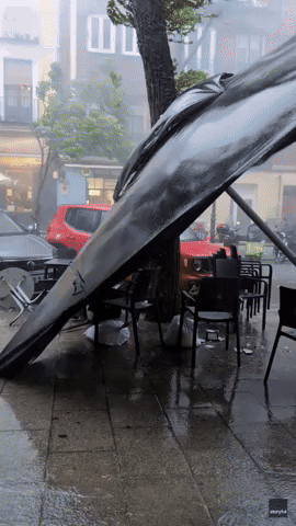 Outdoor Dining Area Blown Away as Storm Batters Madrid