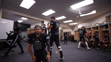 football wink GIF by GreenWave