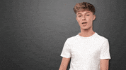 Celebrity gif. HRVY looks at us and points as he says, “Good Job.”
