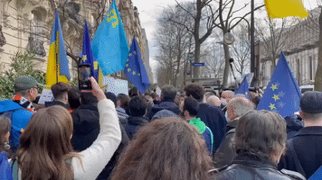 Protesters Rally Outside Russian Embassy in Paris in Support of Ukraine