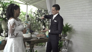 Champagne Bottle Bounces Back Into Grooms Hands