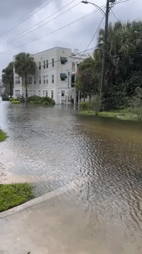 Orlando Paddleboarder Takes Advantage of Tropical Storm Ian Flooding