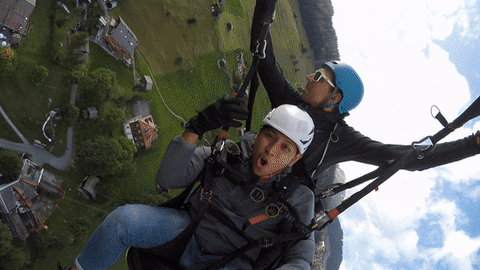 FQHHWT giphyupload switzerland paragliding lauterbrunnen GIF