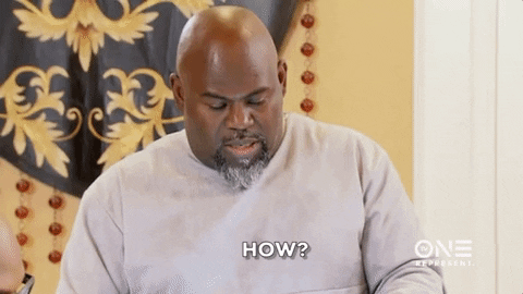 TV gif. The camera zooms in on Actor David Mann on the Manns as he looks down to read something. His head pops up with surprise and a little bit of concern, and he says, “How?” 