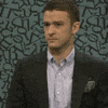 Celebrity gif. Justin Timberlake looking awkwardly stunned and nervous, with a straight face and subtle roving eyes.