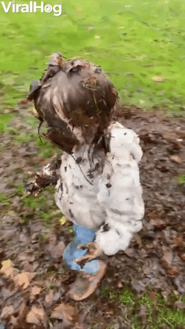 Little Girl Puts on a Mud Mask