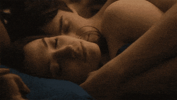 man and woman love GIF