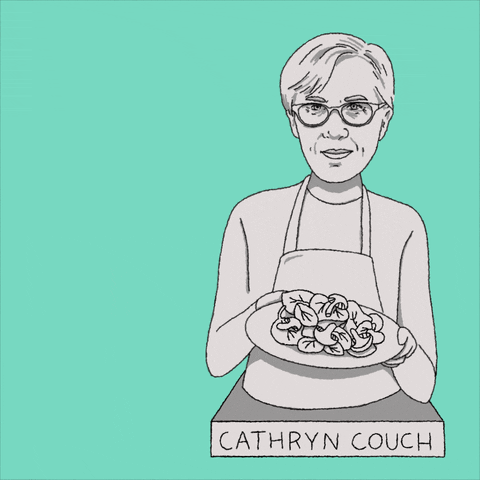 People cooking healthy meals together in community setting