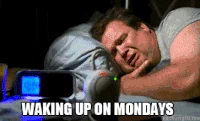 TV gif. Eric Stonestreet as Cameron from Modern Family lies in bed crying, while devices glow at him from a bedside table in the foreground. Text, 