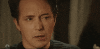 SNL gif. Beck Bennett's face subtly transitions from mildly confused to bewildered, as if he had a sudden realization.