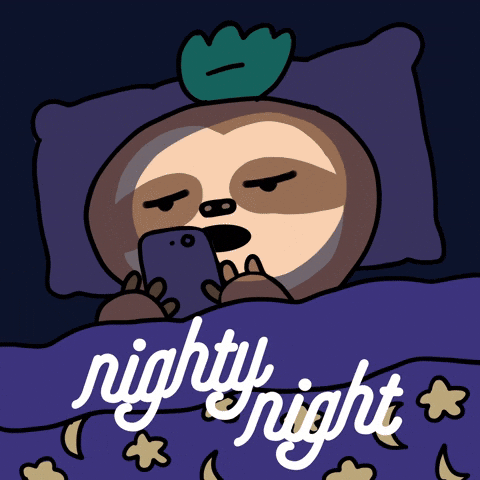 Cartoon gif. A very sleepy sloth holds its phone in front of its face while lying in bed with the covers pulled up to its neck. Its eyes slowly close over and over--it can't stay awake! Text, "nighty night."